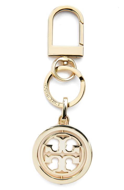 Tory burch keychain - Tory Burch Virginia Printed Nylon Mini Backpack Key Ring Fob Keychain Floral block Print Black Multi ! Rare hard to find coin pouch ! Multicolour printed mini backpack keyring from TORY BURCH featuring silver-tone hardware, top zip fastening, front zip-fastening pocket, lobster claw fastening and backpack bag charm. - 100% recycled …